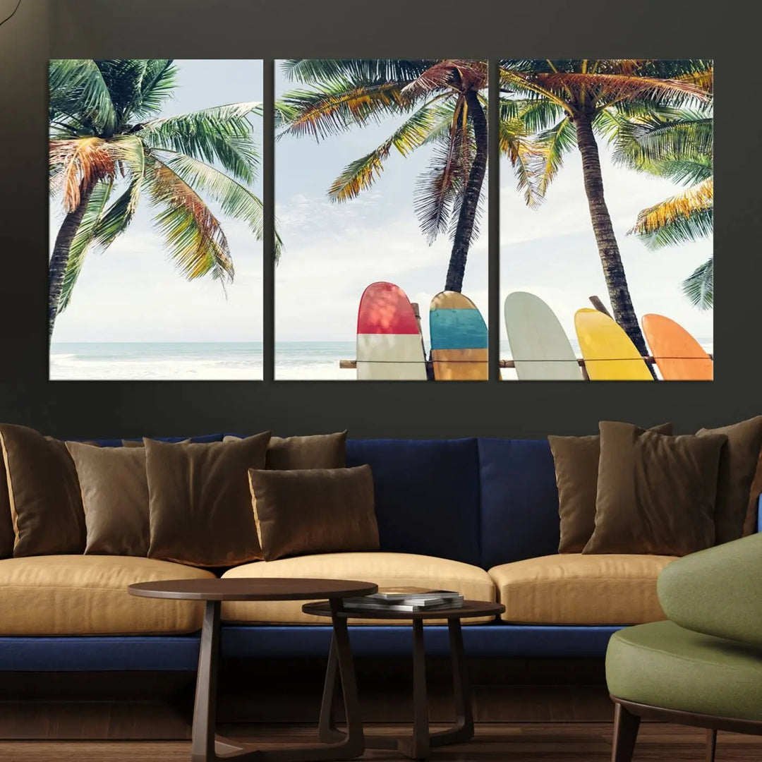 The room showcases The Palm and Surfing Board Wall Art Canvas Print, a triptych of palm trees and surfboards by the beach, elegantly gallery wrapped for a sophisticated finish.