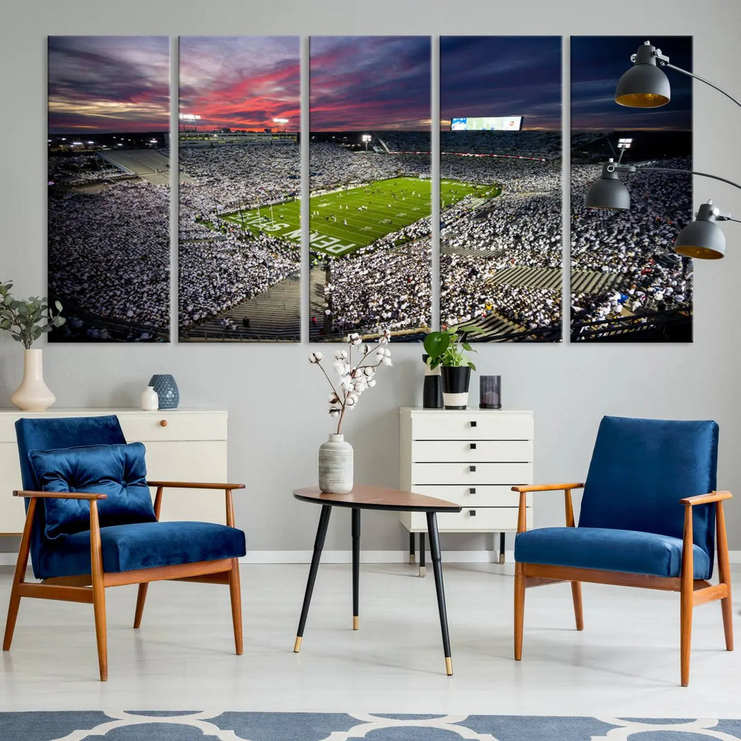 The living room features a breathtaking triptych canvas titled "Penn State Nittany Lions Football Team Print - University Park Beaver Stadium Wall Art Canvas Print," depicting a stadium at sunset. This gallery-quality finish is sure to elevate the aesthetic of any space.