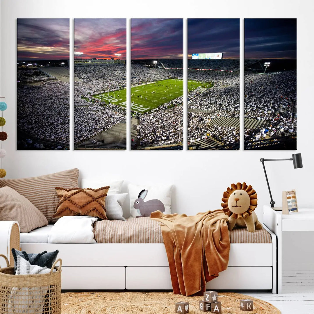 The living room features a breathtaking triptych canvas titled "Penn State Nittany Lions Football Team Print - University Park Beaver Stadium Wall Art Canvas Print," depicting a stadium at sunset. This gallery-quality finish is sure to elevate the aesthetic of any space.