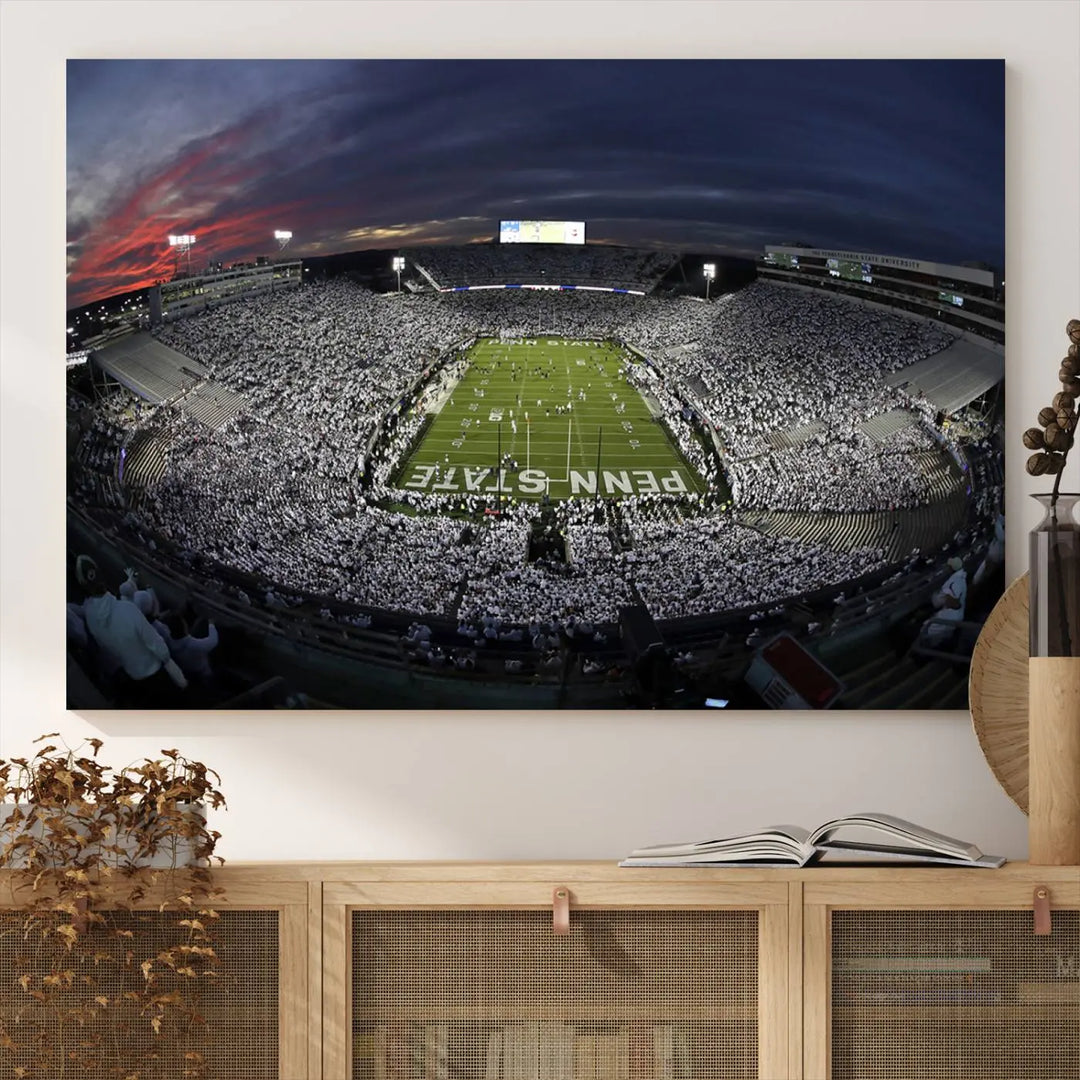 The Penn State University Nittany Lions Football Team Print, showcasing a panoramic view of University Park Beaver Stadium at sunset, features a gallery-quality finish on premium canvas that adds an elegant touch.