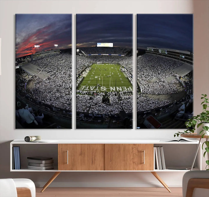 The Penn State University Nittany Lions Football Team Print, showcasing a panoramic view of University Park Beaver Stadium at sunset, features a gallery-quality finish on premium canvas that adds an elegant touch.