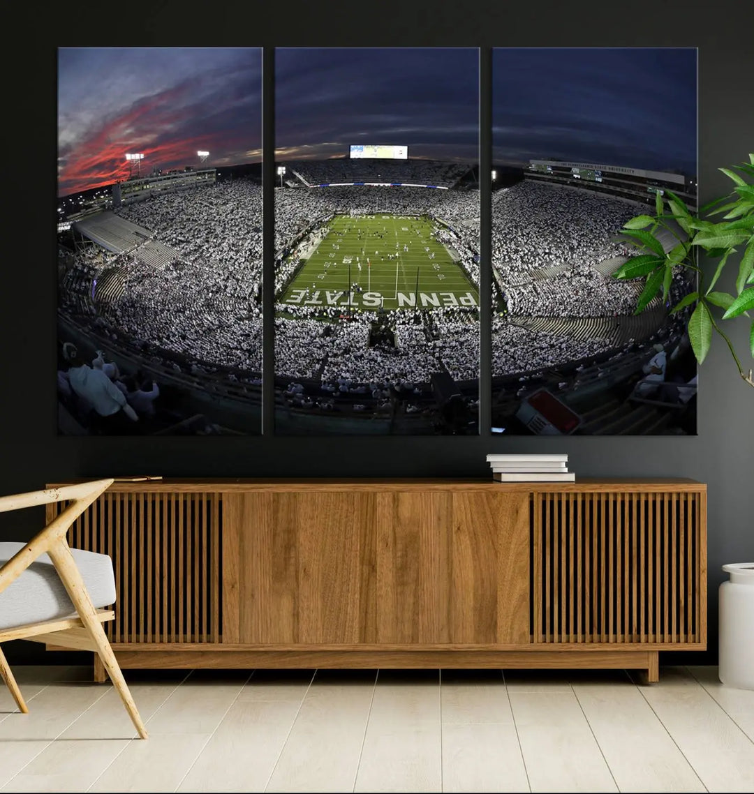 The Penn State University Nittany Lions Football Team Print, showcasing a panoramic view of University Park Beaver Stadium at sunset, features a gallery-quality finish on premium canvas that adds an elegant touch.