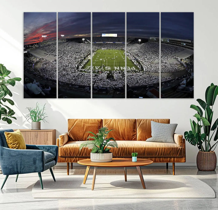 The Penn State University Nittany Lions Football Team Print, showcasing a panoramic view of University Park Beaver Stadium at sunset, features a gallery-quality finish on premium canvas that adds an elegant touch.