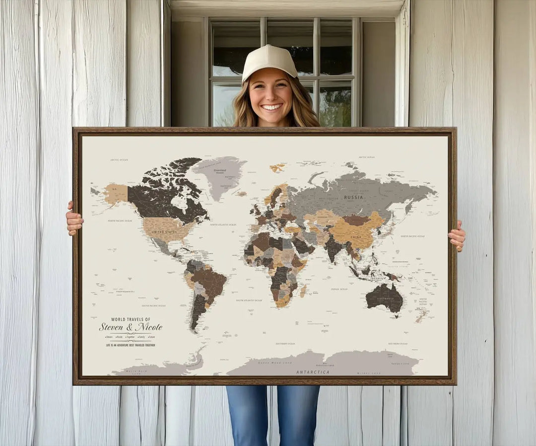 A large framed Personalized World Map Wall Art Canvas Print features custom text at the bottom, perfect for travel and exploration enthusiasts.