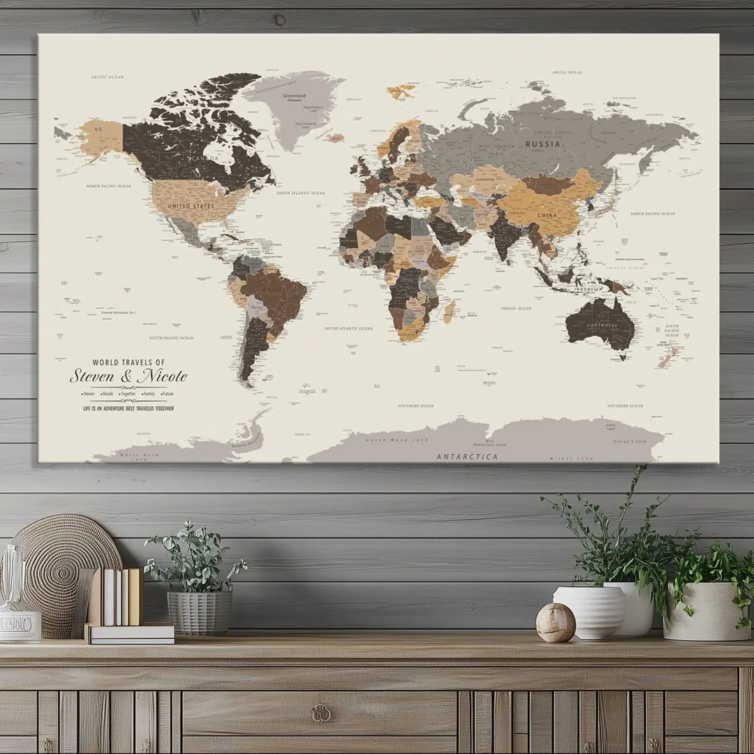 A large framed Personalized World Map Wall Art Canvas Print features custom text at the bottom, perfect for travel and exploration enthusiasts.