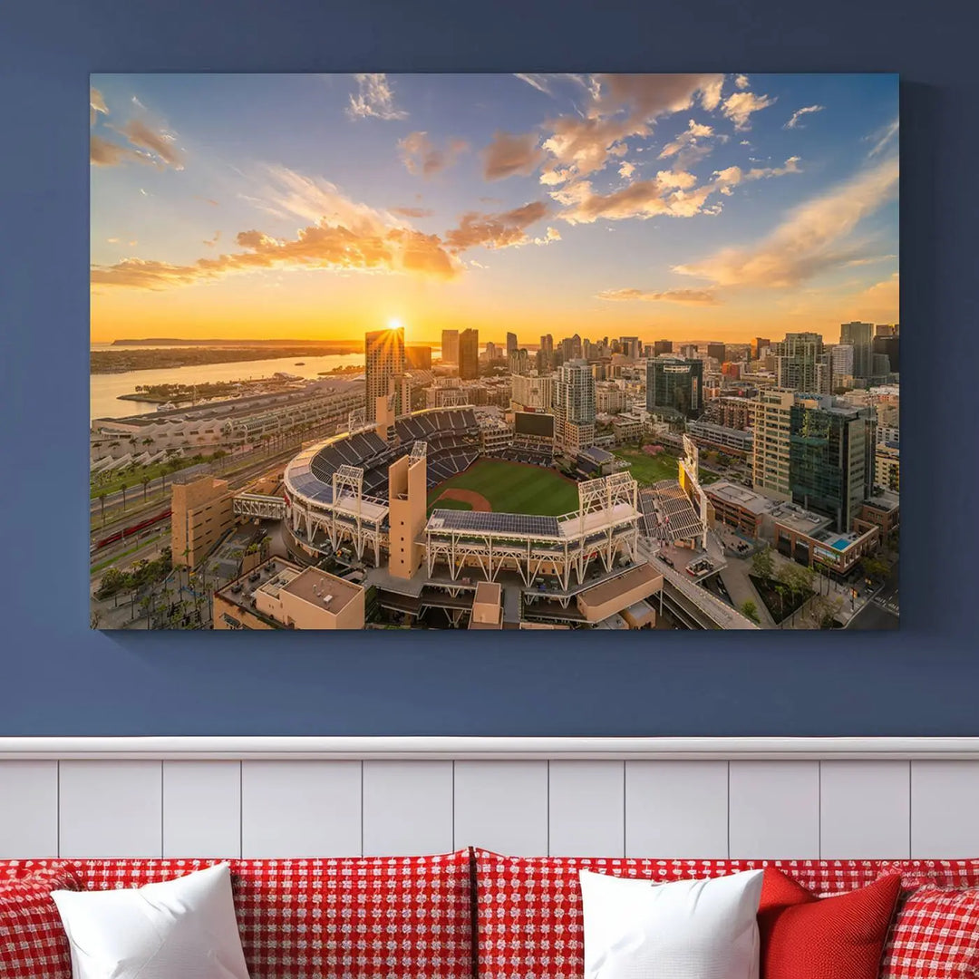 This Petco Park Sunset Triple Canvas Wall Art beautifully captures a vibrant San Diego cityscape at sunset, showcasing the iconic glow of Petco Park and high-rise buildings against a colorful sky.