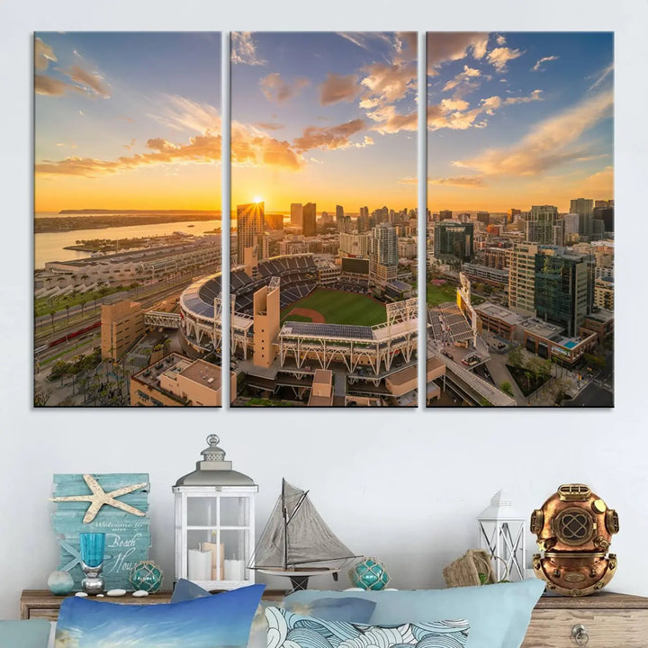 This Petco Park Sunset Triple Canvas Wall Art beautifully captures a vibrant San Diego cityscape at sunset, showcasing the iconic glow of Petco Park and high-rise buildings against a colorful sky.