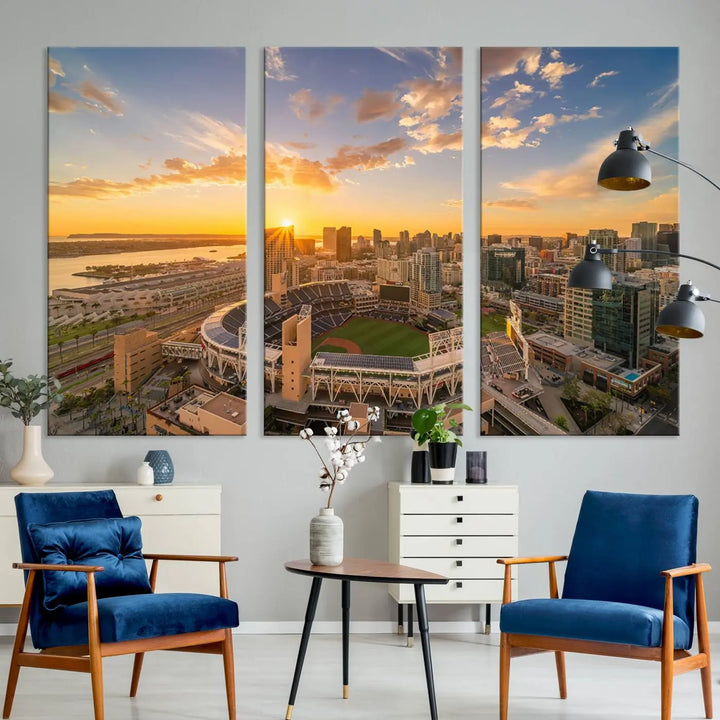 This Petco Park Sunset Triple Canvas Wall Art beautifully captures a vibrant San Diego cityscape at sunset, showcasing the iconic glow of Petco Park and high-rise buildings against a colorful sky.