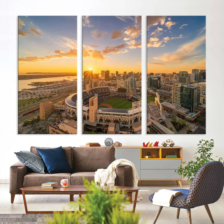 This Petco Park Sunset Triple Canvas Wall Art beautifully captures a vibrant San Diego cityscape at sunset, showcasing the iconic glow of Petco Park and high-rise buildings against a colorful sky.