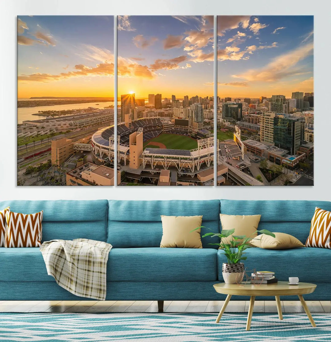 This Petco Park Sunset Triple Canvas Wall Art beautifully captures a vibrant San Diego cityscape at sunset, showcasing the iconic glow of Petco Park and high-rise buildings against a colorful sky.