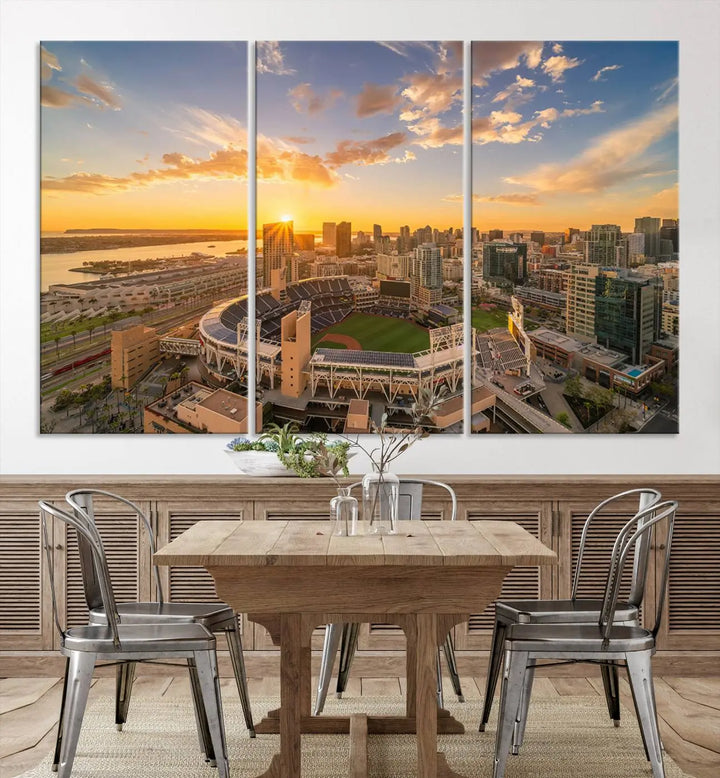 This Petco Park Sunset Triple Canvas Wall Art beautifully captures a vibrant San Diego cityscape at sunset, showcasing the iconic glow of Petco Park and high-rise buildings against a colorful sky.