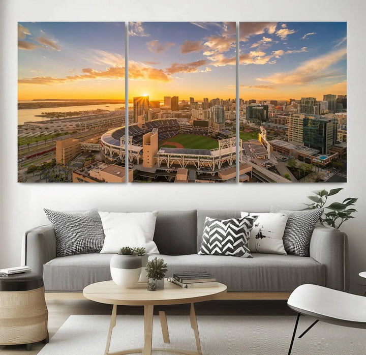 This Petco Park Sunset Triple Canvas Wall Art beautifully captures a vibrant San Diego cityscape at sunset, showcasing the iconic glow of Petco Park and high-rise buildings against a colorful sky.