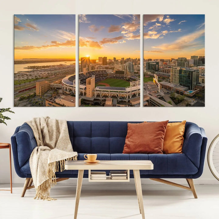 This Petco Park Sunset Triple Canvas Wall Art beautifully captures a vibrant San Diego cityscape at sunset, showcasing the iconic glow of Petco Park and high-rise buildings against a colorful sky.