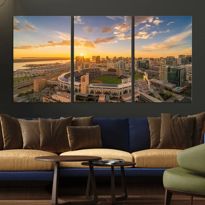 This Petco Park Sunset Triple Canvas Wall Art beautifully captures a vibrant San Diego cityscape at sunset, showcasing the iconic glow of Petco Park and high-rise buildings against a colorful sky.