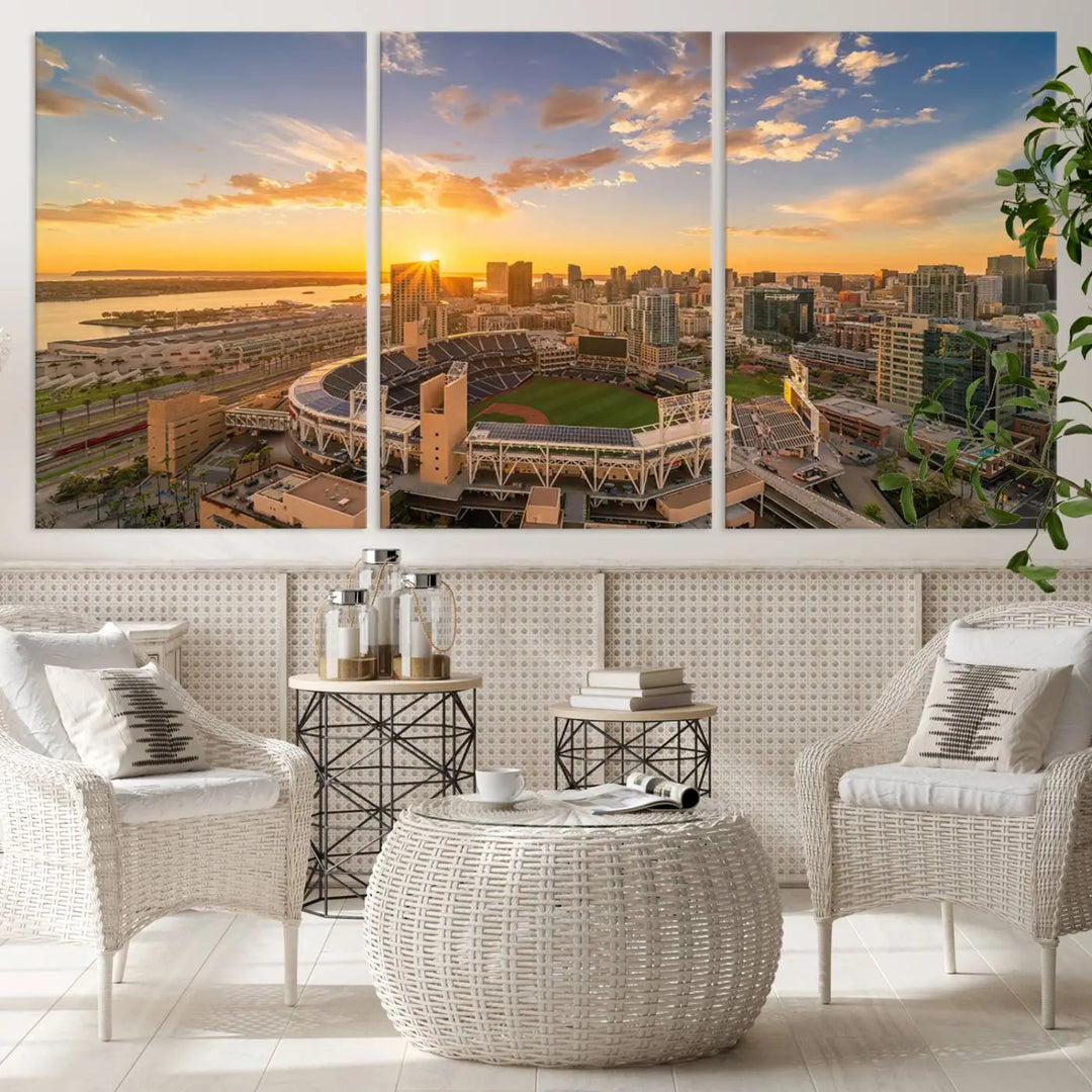 This Petco Park Sunset Triple Canvas Wall Art beautifully captures a vibrant San Diego cityscape at sunset, showcasing the iconic glow of Petco Park and high-rise buildings against a colorful sky.