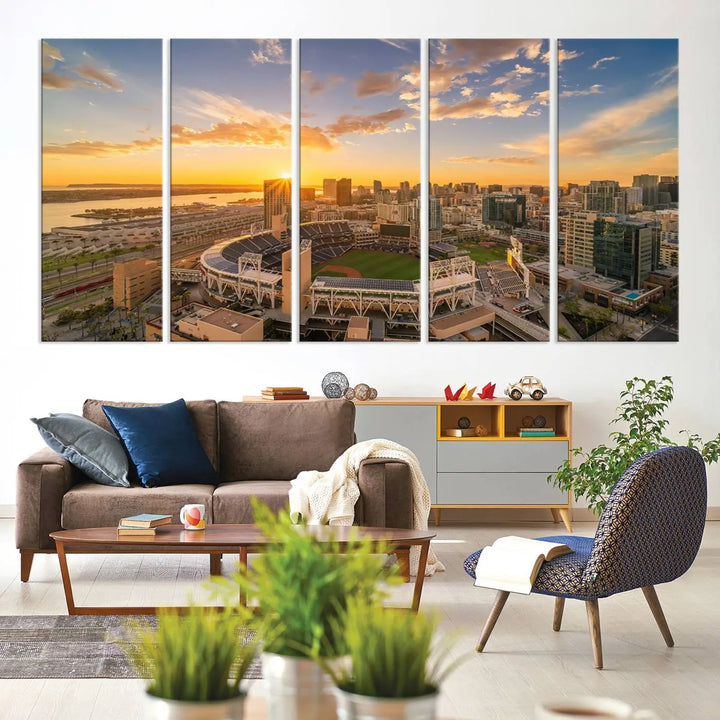 This Petco Park Sunset Triple Canvas Wall Art beautifully captures a vibrant San Diego cityscape at sunset, showcasing the iconic glow of Petco Park and high-rise buildings against a colorful sky.