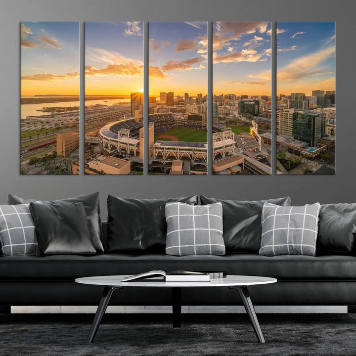 This Petco Park Sunset Triple Canvas Wall Art beautifully captures a vibrant San Diego cityscape at sunset, showcasing the iconic glow of Petco Park and high-rise buildings against a colorful sky.