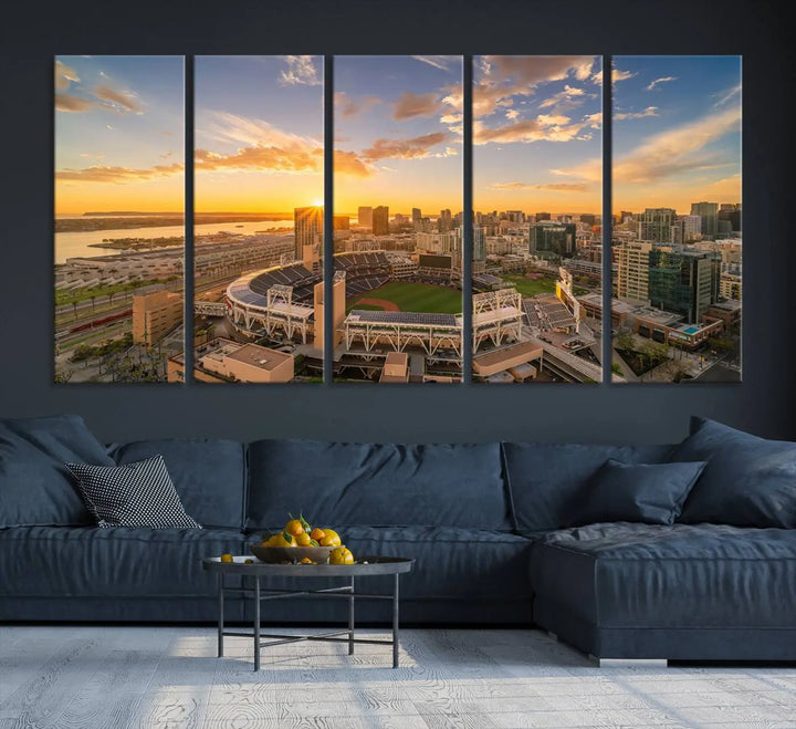 This Petco Park Sunset Triple Canvas Wall Art beautifully captures a vibrant San Diego cityscape at sunset, showcasing the iconic glow of Petco Park and high-rise buildings against a colorful sky.