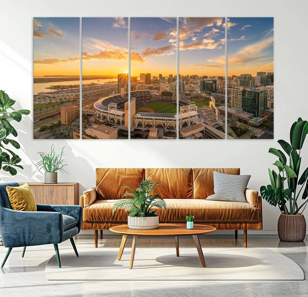 This Petco Park Sunset Triple Canvas Wall Art beautifully captures a vibrant San Diego cityscape at sunset, showcasing the iconic glow of Petco Park and high-rise buildings against a colorful sky.