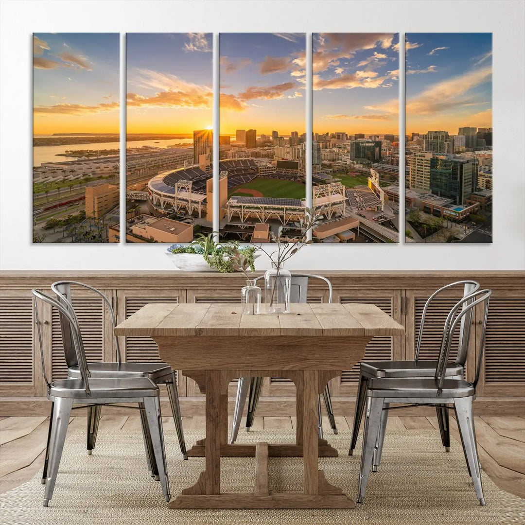 This Petco Park Sunset Triple Canvas Wall Art beautifully captures a vibrant San Diego cityscape at sunset, showcasing the iconic glow of Petco Park and high-rise buildings against a colorful sky.