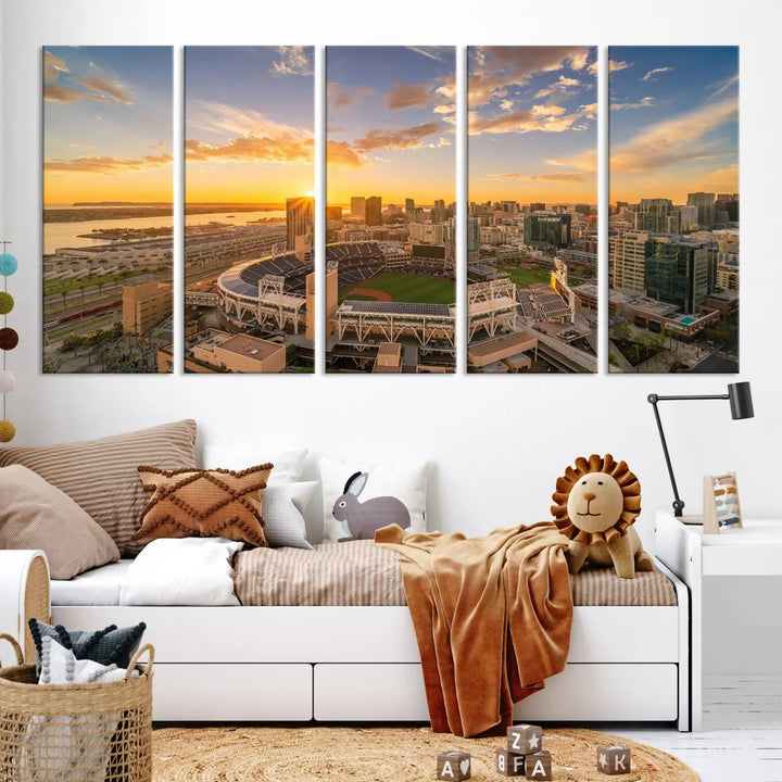 This Petco Park Sunset Triple Canvas Wall Art beautifully captures a vibrant San Diego cityscape at sunset, showcasing the iconic glow of Petco Park and high-rise buildings against a colorful sky.