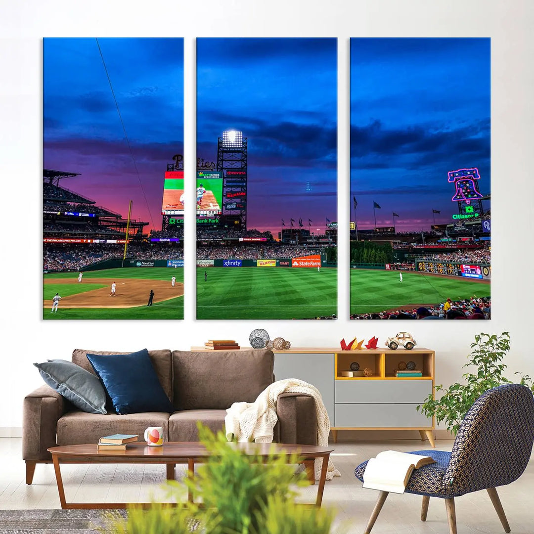 The living room showcases a large triptych of the Philadelphia Phillies Baseball Team Print - Philadelphia Citizens Bank Park Stadium on the wall, featuring premium canvas handmade wall art that adds an elegant touch.