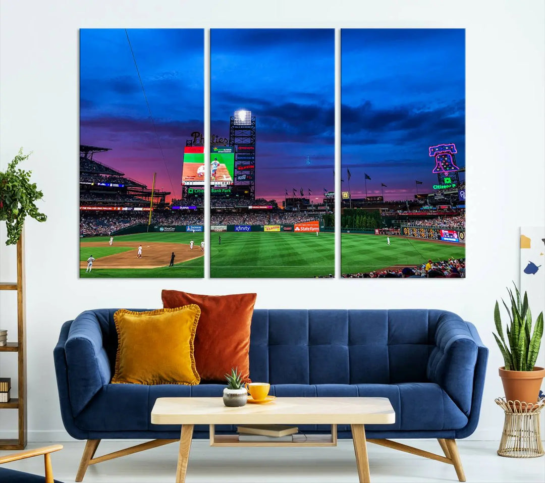 The living room showcases a large triptych of the Philadelphia Phillies Baseball Team Print - Philadelphia Citizens Bank Park Stadium on the wall, featuring premium canvas handmade wall art that adds an elegant touch.