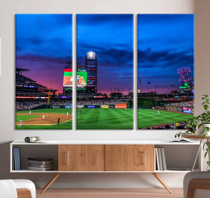 The living room showcases a large triptych of the Philadelphia Phillies Baseball Team Print - Philadelphia Citizens Bank Park Stadium on the wall, featuring premium canvas handmade wall art that adds an elegant touch.