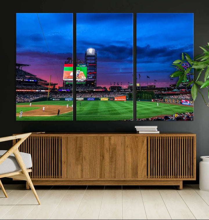 The living room showcases a large triptych of the Philadelphia Phillies Baseball Team Print - Philadelphia Citizens Bank Park Stadium on the wall, featuring premium canvas handmade wall art that adds an elegant touch.