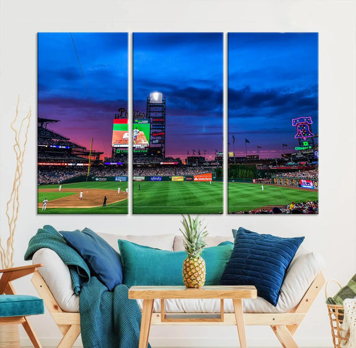 The living room showcases a large triptych of the Philadelphia Phillies Baseball Team Print - Philadelphia Citizens Bank Park Stadium on the wall, featuring premium canvas handmade wall art that adds an elegant touch.