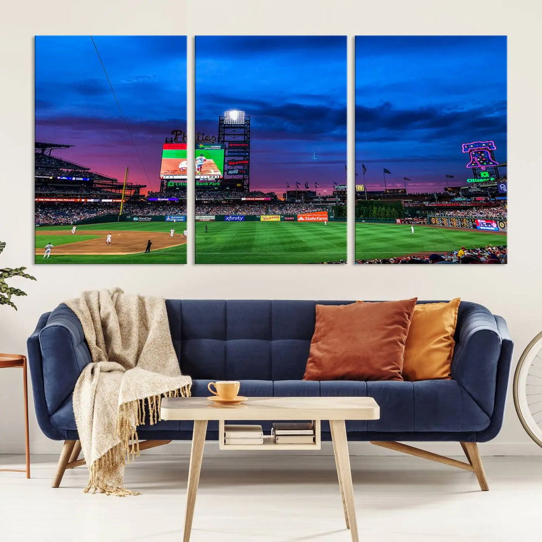 The living room showcases a large triptych of the Philadelphia Phillies Baseball Team Print - Philadelphia Citizens Bank Park Stadium on the wall, featuring premium canvas handmade wall art that adds an elegant touch.