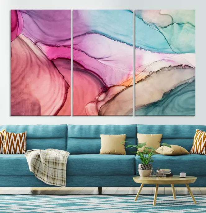 The Pink Abstract Marble Wall Art Canvas Print, a five-panel masterpiece on museum-quality canvas, showcases pink, blue, and beige waves. This gallery-wrapped artwork includes a UV-protective coating to ensure lasting vibrancy.