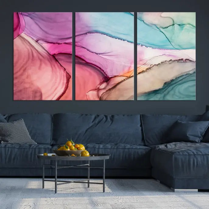 The Pink Abstract Marble Wall Art Canvas Print, a five-panel masterpiece on museum-quality canvas, showcases pink, blue, and beige waves. This gallery-wrapped artwork includes a UV-protective coating to ensure lasting vibrancy.