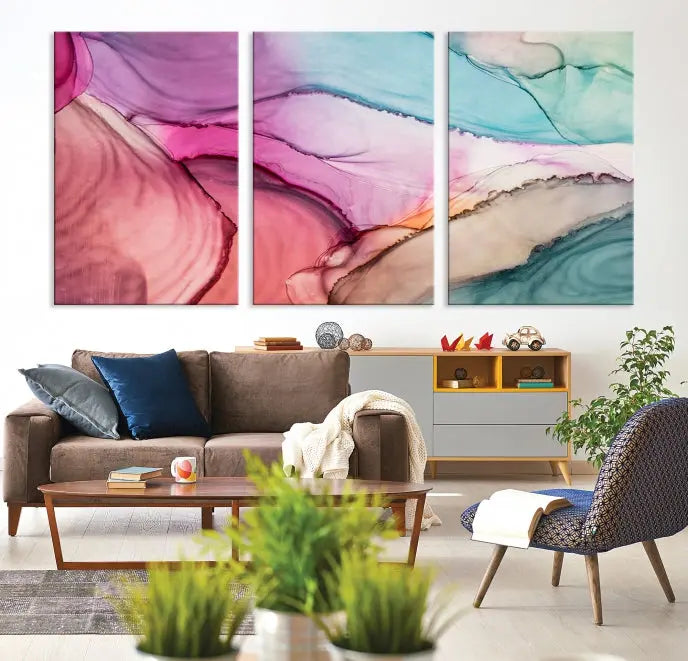 The Pink Abstract Marble Wall Art Canvas Print, a five-panel masterpiece on museum-quality canvas, showcases pink, blue, and beige waves. This gallery-wrapped artwork includes a UV-protective coating to ensure lasting vibrancy.