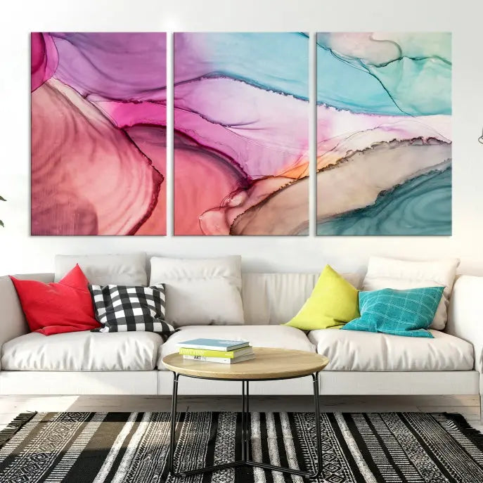 The Pink Abstract Marble Wall Art Canvas Print, a five-panel masterpiece on museum-quality canvas, showcases pink, blue, and beige waves. This gallery-wrapped artwork includes a UV-protective coating to ensure lasting vibrancy.