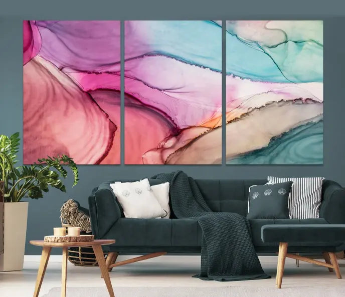 The Pink Abstract Marble Wall Art Canvas Print, a five-panel masterpiece on museum-quality canvas, showcases pink, blue, and beige waves. This gallery-wrapped artwork includes a UV-protective coating to ensure lasting vibrancy.