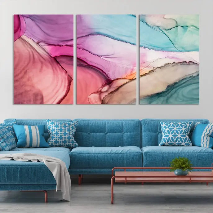 The Pink Abstract Marble Wall Art Canvas Print, a five-panel masterpiece on museum-quality canvas, showcases pink, blue, and beige waves. This gallery-wrapped artwork includes a UV-protective coating to ensure lasting vibrancy.