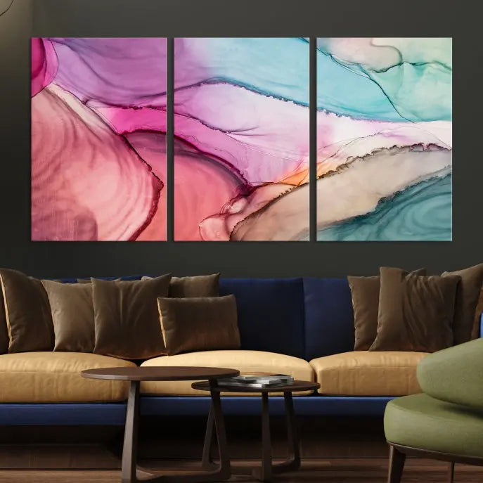 The Pink Abstract Marble Wall Art Canvas Print, a five-panel masterpiece on museum-quality canvas, showcases pink, blue, and beige waves. This gallery-wrapped artwork includes a UV-protective coating to ensure lasting vibrancy.