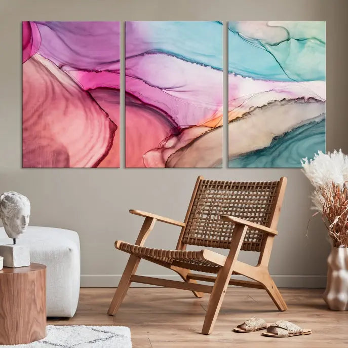 The Pink Abstract Marble Wall Art Canvas Print, a five-panel masterpiece on museum-quality canvas, showcases pink, blue, and beige waves. This gallery-wrapped artwork includes a UV-protective coating to ensure lasting vibrancy.