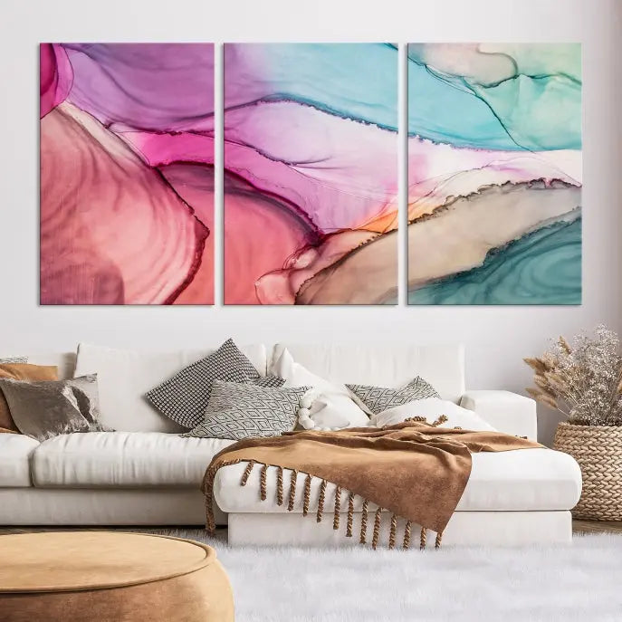 The Pink Abstract Marble Wall Art Canvas Print, a five-panel masterpiece on museum-quality canvas, showcases pink, blue, and beige waves. This gallery-wrapped artwork includes a UV-protective coating to ensure lasting vibrancy.