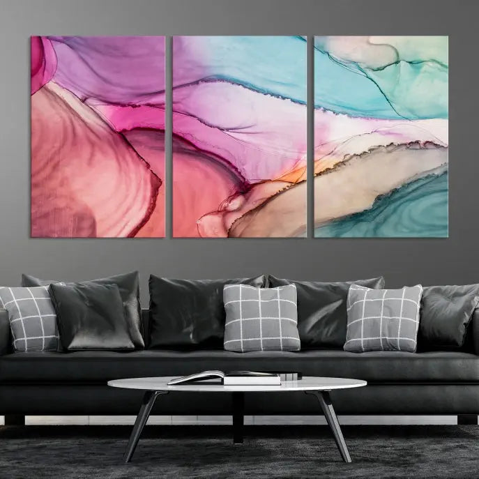 The Pink Abstract Marble Wall Art Canvas Print, a five-panel masterpiece on museum-quality canvas, showcases pink, blue, and beige waves. This gallery-wrapped artwork includes a UV-protective coating to ensure lasting vibrancy.