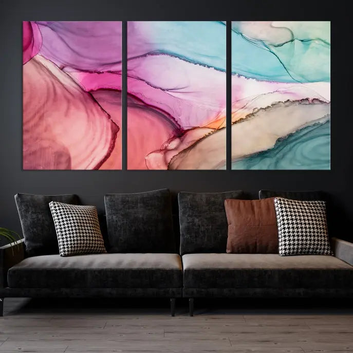 The Pink Abstract Marble Wall Art Canvas Print, a five-panel masterpiece on museum-quality canvas, showcases pink, blue, and beige waves. This gallery-wrapped artwork includes a UV-protective coating to ensure lasting vibrancy.