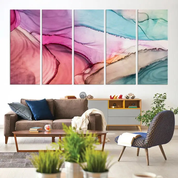 The Pink Abstract Marble Wall Art Canvas Print, a five-panel masterpiece on museum-quality canvas, showcases pink, blue, and beige waves. This gallery-wrapped artwork includes a UV-protective coating to ensure lasting vibrancy.