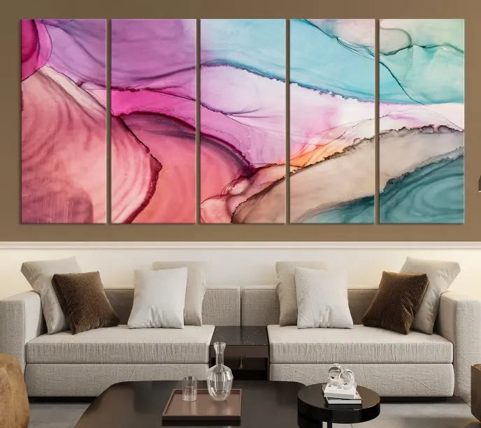 The Pink Abstract Marble Wall Art Canvas Print, a five-panel masterpiece on museum-quality canvas, showcases pink, blue, and beige waves. This gallery-wrapped artwork includes a UV-protective coating to ensure lasting vibrancy.