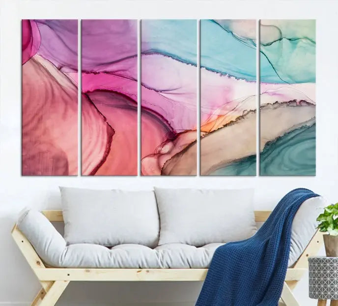 The Pink Abstract Marble Wall Art Canvas Print, a five-panel masterpiece on museum-quality canvas, showcases pink, blue, and beige waves. This gallery-wrapped artwork includes a UV-protective coating to ensure lasting vibrancy.