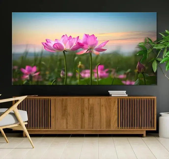 The room features a museum-quality Pink Flower on the Mountain Canvas Print, showcasing blooming pink flowers against a sunset on hand-assembled canvas.