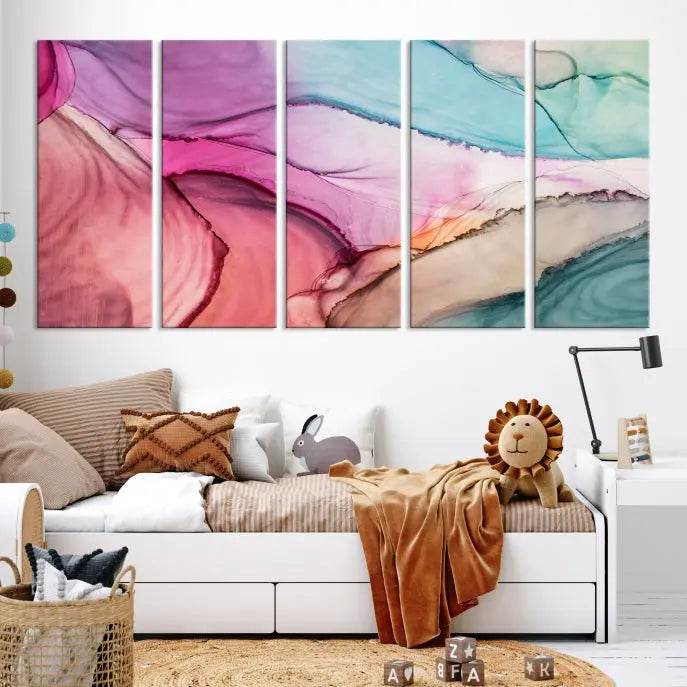 The "Pink Marble Fluid Effect Wall Art Abstract Canvas Wall Art Print" features abstract pink and blue watercolors. This piece is divided into five panels and crafted on museum-quality polycotton canvas with a UV-protective coating to ensure lasting beauty.