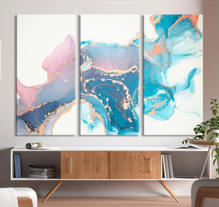 The "Pink and Blue Marble Fluid Effect Wall Art Abstract Canvas Wall Art Print," coated with UV protection, is displayed.