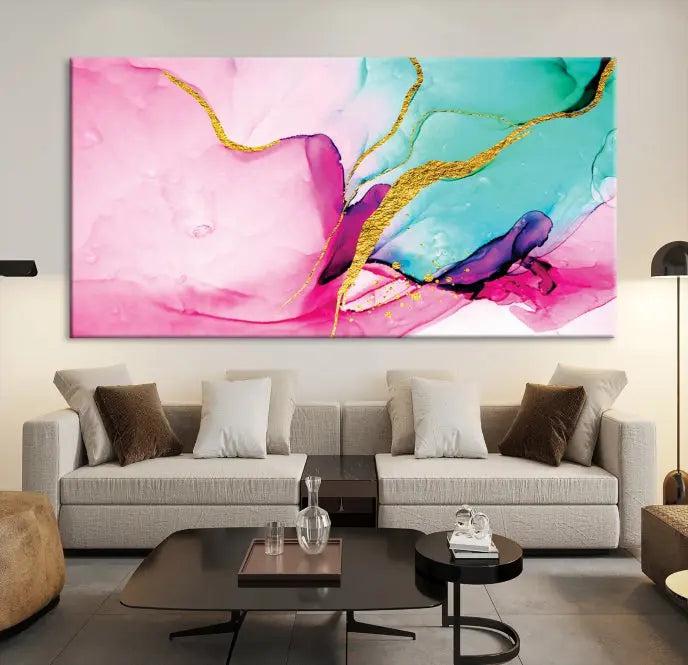 The Pink and Gold Marble Fluid Effect Wall Art Abstract Canvas Wall Art Print embellishes the space with its stunning design. Created on museum-quality canvas, this gallery-wrapped piece includes a UV-protective coating to maintain its vivid colors.