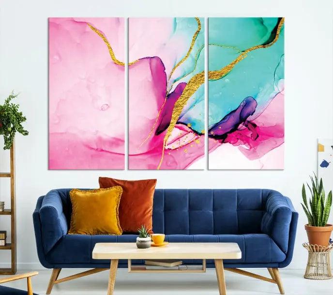 The Pink and Gold Marble Fluid Effect Wall Art Abstract Canvas Wall Art Print embellishes the space with its stunning design. Created on museum-quality canvas, this gallery-wrapped piece includes a UV-protective coating to maintain its vivid colors.